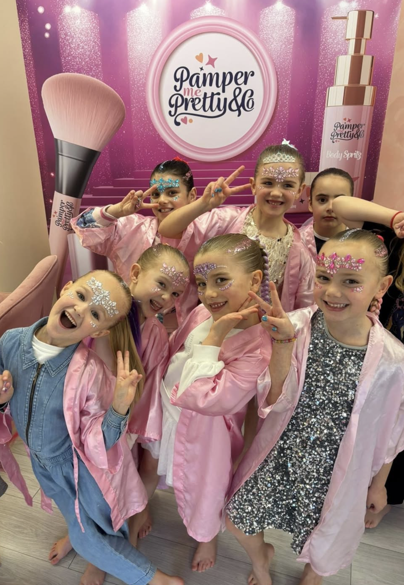 Group of children posing together at a Pamper Me Pretty party